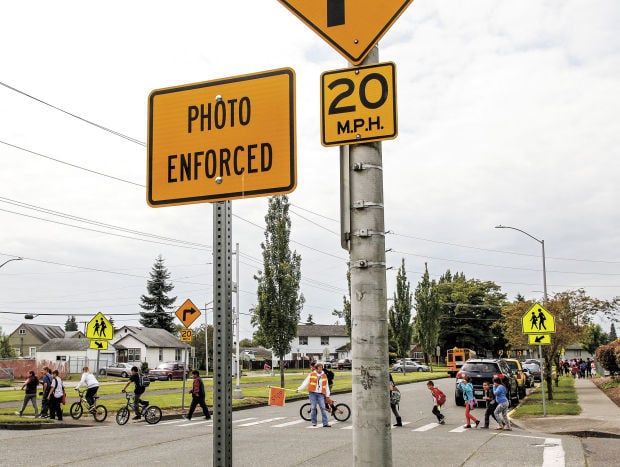 School zones are often monitored by cameras to enforce safe driving.